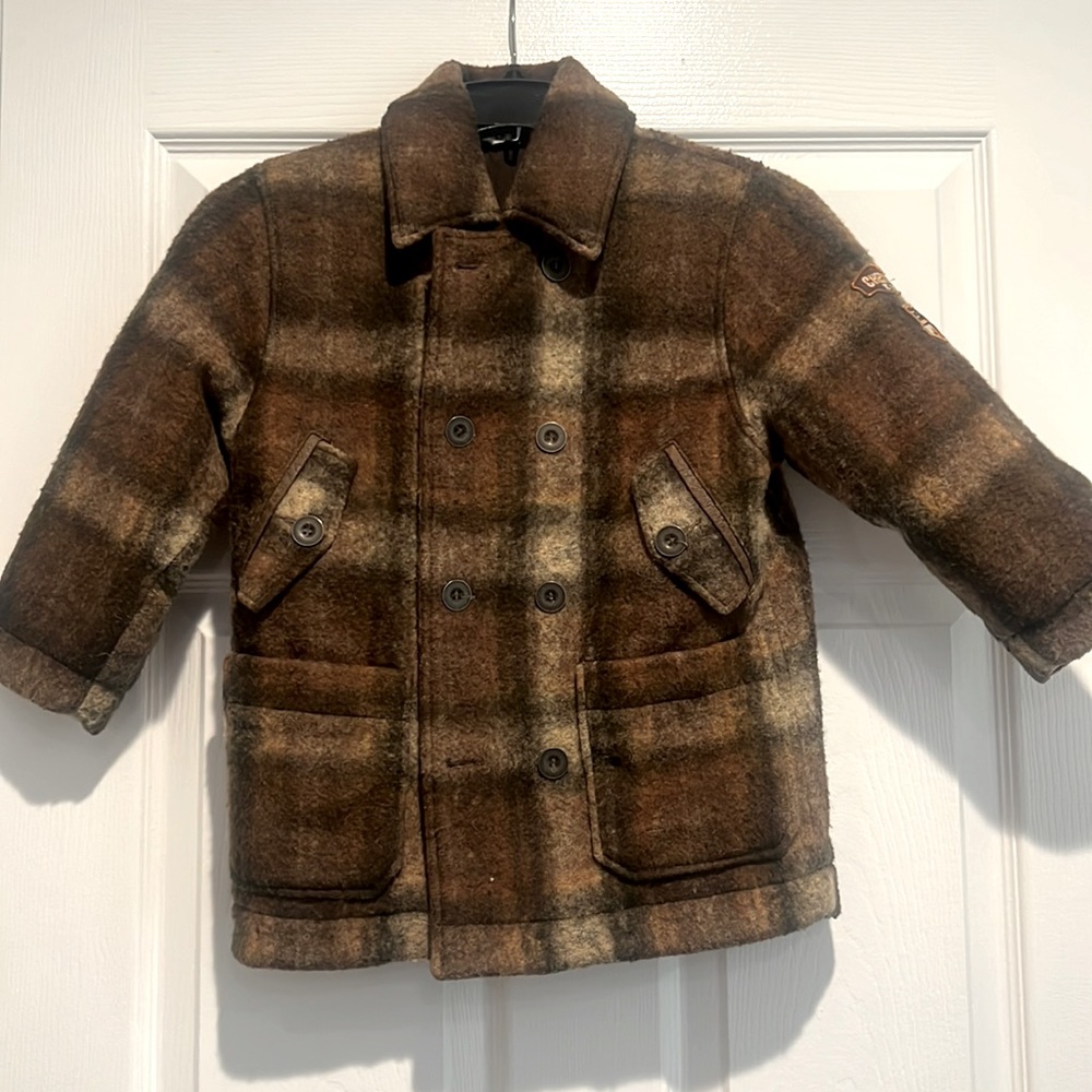 Boys winter coat by Check In. European size 116 which translates to a boys 6-7